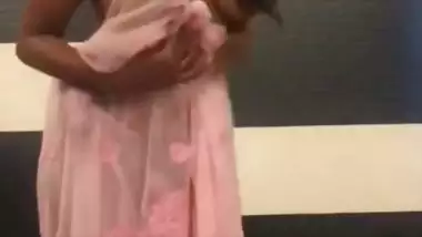 Shapely boobed desi bhabhi stripping saree